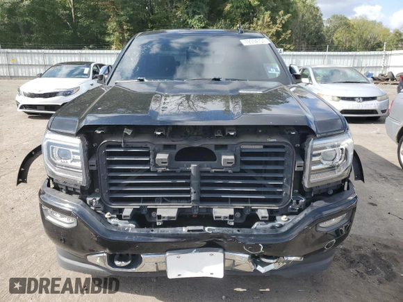 2018 GMC Sierra 1500 Denali z VIN 3GTU2PEJ3JG523077, wystawiony jako Copart lot #72094704 z przebiegiem 117 756 mil mil oraz Szkoda całkowita • Salvage title. Historia ofert i sprzedaży dostępna na DreamBid. Obrazek 5.