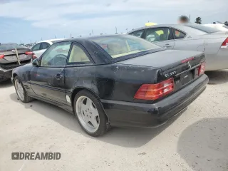 1999 Mercedes-Benz SL-Class with VIN WDBFA68F0XF177818, listed as a Copart auction lot 75025494 with 0 mi miles and Salvage Title. Bid and sale history available at carsss.com. Image 2.