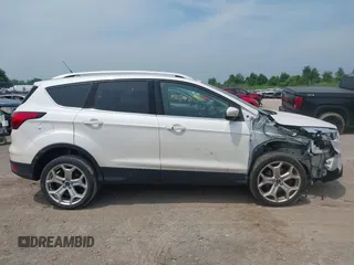 2019 Ford Escape Titanium with VIN 1FMCU9J90KUA86338, listed as a IAAI auction lot 42690159 with 115,891 mi miles and . Bid and sale history available at DreamBid. Image 14.