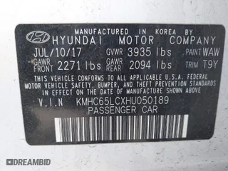 2017 Hyundai Ioniq Hybrid Blue with VIN KMHC65LCXHU050189, listed as a IAAI auction lot 41761768 with 117,688 mi miles. Bid and sale history available at carsss.com. Image 9.