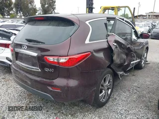 2015 Infiniti QX60 with VIN 5N1AL0MM3FC502870, listed as a IAAI auction lot 41734954 with 117,455 mi miles. Bid and sale history available at carsss.com. Image 4.