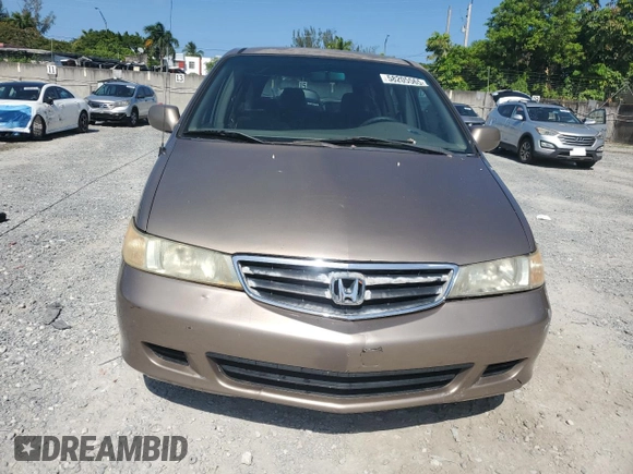 2004 Honda Odyssey EX-RES z VIN 5FNRL18814B125773, wystawiony jako Copart lot #58205565 z przebiegiem 250 732 mil mil oraz Szkoda całkowita • Salvage title. Historia ofert i sprzedaży dostępna na DreamBid. Obrazek 5.