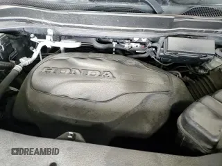 2021 Honda Pilot EX-L z VIN 5FNYF6H58MB059728, wystawiony jako Copart lot #87377645 z przebiegiem 85 007 mil mil oraz Szkoda całkowita • Salvage title. Historia ofert i sprzedaży dostępna na DreamBid. Obrazek 16.