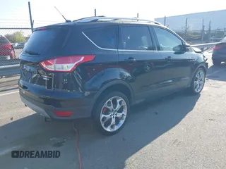2013 Ford Escape Titanium с VIN 1FMCU9J90DUC40758, выставлен на аукционе IAAI как лот 41927827 с пробегом 110 614 миль миль и . История ставок и продаж доступна на DreamBid. Изображение 4.