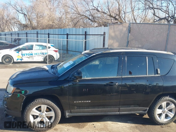 2016 Jeep Compass Sport with VIN 1C4NJCBA8GD560507, listed as a IAAI auction lot 41819228 with 123,294 mi miles and . Bid and sale history available at DreamBid. Image 14.