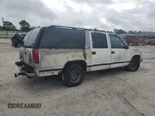 1997 GMC Suburban with VIN 1GKEC16R9VJ728883, listed as a Copart auction lot 52104265 with 246,816 mi miles and Salvage Title. Bid and sale history available at carsss.com. Image 3.