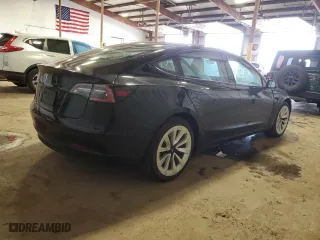 2022 Tesla Model 3 with VIN 5YJ3E1EA2NF336151, listed as a Copart auction lot 50795245 with 14,265 mi miles and Salvage Title. Bid and sale history available at carsss.com. Image 3.