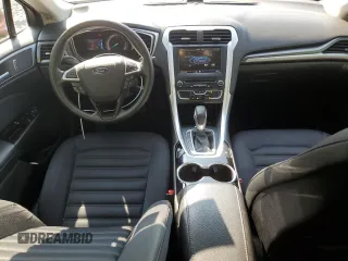 2016 Ford Fusion SE Hybrid z VIN 3FA6P0LU5GR377735, wystawiony jako Copart lot #58791955 z przebiegiem 135 798 mil mil oraz Szkoda całkowita • Salvage title. Historia ofert i sprzedaży dostępna na DreamBid. Obrazek 8.