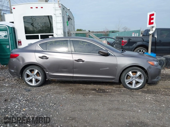 2013 Acura ILX Premium z VIN 19VDE1F54DE001539, wystawiony jako IAAI lot #42015973 z przebiegiem Nie podano mil oraz . Historia ofert i sprzedaży dostępna na DreamBid. Obrazek 12.