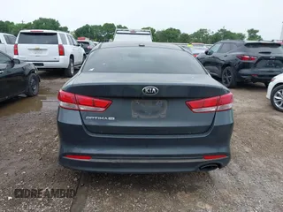 2016 Kia Optima LX with VIN KNAGT4L37G5070799, listed as a IAAI auction lot 41963239 with 116,308 mi miles. Bid and sale history available at carsss.com. Image 16.