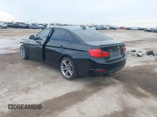 2014 BMW 3 Series 328i xDrive with VIN WBA3B3G57ENR82319, listed as a IAAI auction lot 41655950 with 130,926 mi miles. Bid and sale history available at carsss.com. Image 3.