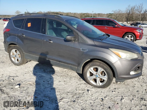 2013 Ford Escape SE with VIN 1FMCU0GX1DUB10439, listed as a Copart auction lot 49320845 with 145,614 mi miles and Clean title. Bid and sale history available at DreamBid. Image 4.