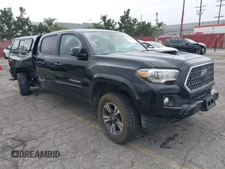 2018 Toyota Tacoma SR5 with VIN 3TMBZ5DN8JM015331, listed as a IAAI auction lot 42197079 with 84,035 mi miles and . Bid and sale history available at DreamBid. Image 1.