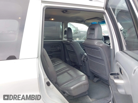 2003 Honda Pilot EX with VIN 2HKYF18623H576163, listed as a IAAI auction lot 41948133 with 244,516 mi miles and . Bid and sale history available at DreamBid. Image 8.