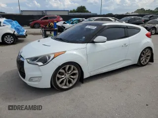 2013 Hyundai Veloster w/Red Int with VIN KMHTC6AD8DU091361, listed as a Copart auction lot 65740835 with 128,842 mi miles and Clean title. Bid and sale history available at DreamBid. Image 1.