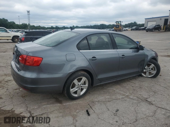 2014 Volkswagen Jetta TDI w/Premium/Nav z VIN 3VWLL7AJ1EM430822, wystawiony jako Copart lot #57405845 z przebiegiem 112 178 mil mil oraz Szkoda całkowita • Salvage title. Historia ofert i sprzedaży dostępna na DreamBid. Obrazek 3.