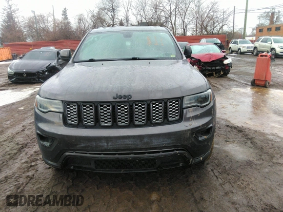 2020 Jeep Grand Cherokee Altitude with VIN 1C4RJFAGXLC211518, listed as a IAAI auction lot 41668994 with 130,371 mi miles. Bid and sale history available at carsss.com. Image 12.