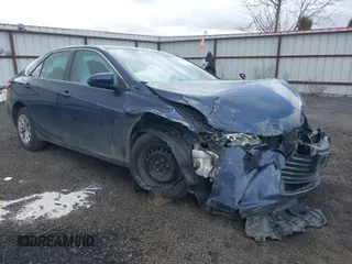 2016 Toyota Camry XLE with VIN 4T4BF1FK6GR519063, listed as a IAAI auction lot 41939684 with 162,544 mi miles. Bid and sale history available at carsss.com. Image 1.