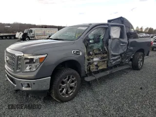 2018 Nissan Titan XD SV with VIN 1N6BA1F49JN531558, listed as a Copart auction lot 87273124 with 121,864 mi miles and Salvage Title. Bid and sale history available at carsss.com. Image 1.