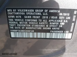 2013 Volkswagen Passat SE with VIN 1VWBP7A36DC039148, listed as a IAAI auction lot 42075823 with 196,734 mi miles. Bid and sale history available at carsss.com. Image 9.
