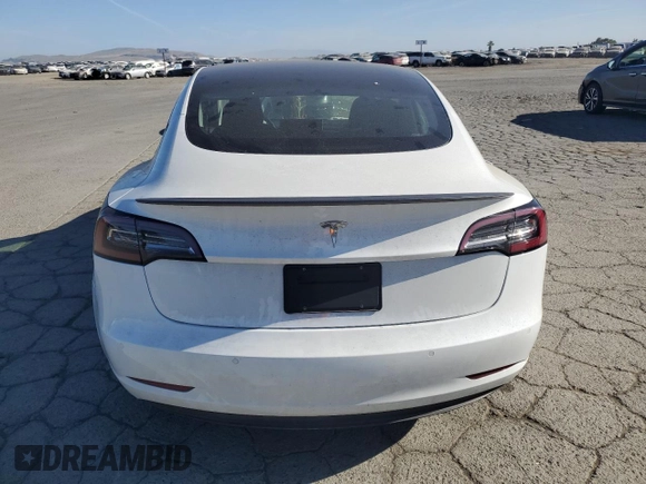 2019 Tesla Model 3 Mid Range z VIN 5YJ3E1EA7KF326727, wystawiony jako Copart lot #56243505 z przebiegiem 49 009 mil mil oraz Szkoda całkowita • Salvage title. Historia ofert i sprzedaży dostępna na DreamBid. Obrazek 6.