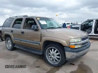2003 Chevrolet Tahoe LS with VIN 1GNEC13V33J338251, listed as a IAAI auction lot 41634451 with 265,779 mi miles. Bid and sale history available at carsss.com. Image 1.