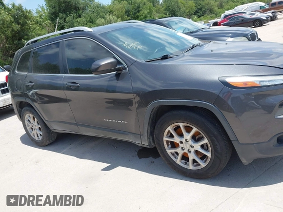 2016 Jeep Cherokee Latitude with VIN 1C4PJLCBXGW265431, listed as a IAAI auction lot 42542328 with 127,249 mi miles and . Bid and sale history available at DreamBid. Image 13.