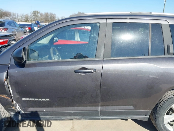 2015 Jeep Compass Sport with VIN 1C4NJCBBXFD274472, listed as a IAAI auction lot 41629585 with 124,407 mi miles. Bid and sale history available at carsss.com. Image 15.