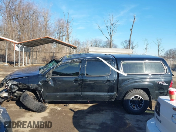 2011 Toyota Tacoma with VIN 3TMLU4EN4BM058738, listed as a IAAI auction lot 41646897 with 117,817 mi miles and . Bid and sale history available at DreamBid. Image 14.