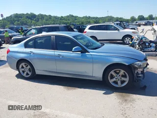 2014 BMW 3 Series 320i xDrive with VIN WBA3C3C59EF986353, listed as a IAAI auction lot 42383107 with 142,836 mi miles and . Bid and sale history available at DreamBid. Image 13.