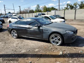 2015 BMW 6 Series 640i with VIN WBA6A0C5XFD318947, listed as a Copart auction lot 50228615 with 78,202 mi miles and Clean Title. Bid and sale history available at carsss.com. Image 4.