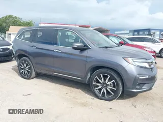 2022 Honda Pilot Elite with VIN 5FNYF6H04NB025212, listed as a IAAI auction lot 42430032 with 69,427 mi miles and . Bid and sale history available at DreamBid. Image 1.