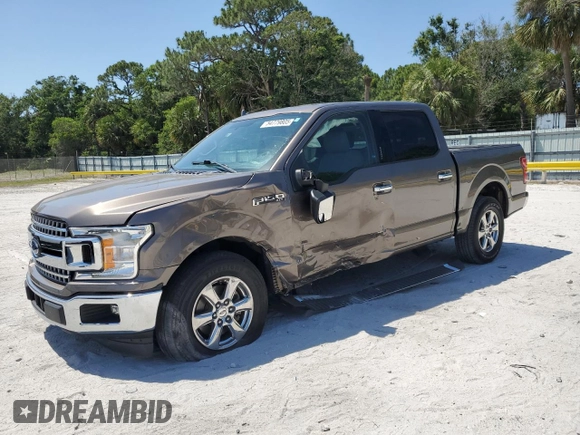 2018 Ford F-150 XL with VIN 1FTEW1CG4JKC38569, listed as a Copart auction lot 54779805 with 97,190 mi miles and Salvage Title. Bid and sale history available at carsss.com. Image 1.