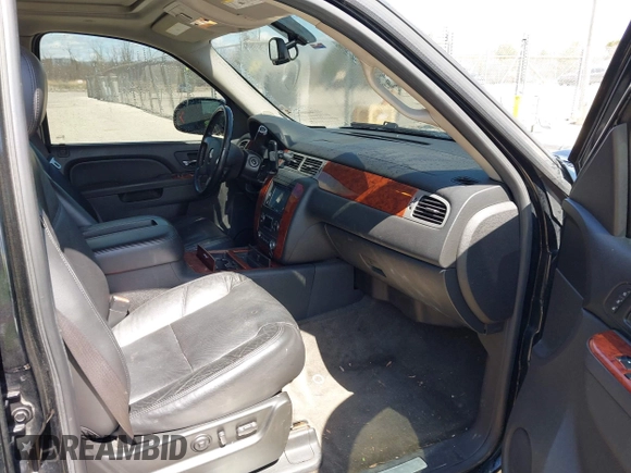 2010 Chevrolet Suburban LTZ with VIN 1GNUKKE39AR106851, listed as a IAAI auction lot 41994155 with 148,776 mi miles. Bid and sale history available at carsss.com. Image 5.