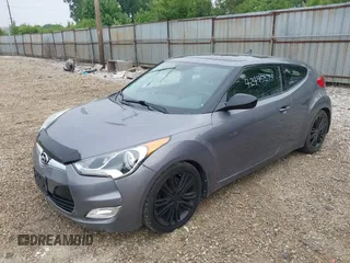 2012 Hyundai Veloster w/Gray Int z VIN KMHTC6ADXCU030284, wystawiony jako IAAI lot #42445394 z przebiegiem 156 536 mil mil oraz . Historia ofert i sprzedaży dostępna na DreamBid. Obrazek 2.