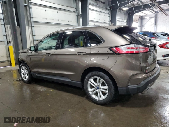 2019 Ford Edge SEL с VIN 2FMPK4J96KBB69644, выставлен на аукционе Copart как лот 58523025 с пробегом 72 024 миль миль и Списание • Salvage title. История ставок и продаж доступна на DreamBid. Изображение 2.
