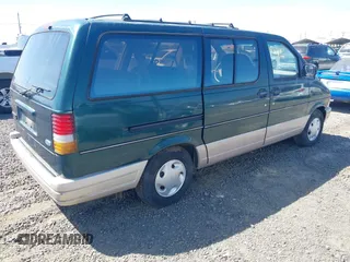 1995 Ford Aerostar z VIN 1FMDA31UXSZA09686, wystawiony jako IAAI lot #42014562 z przebiegiem 122 567 mil mil oraz . Historia ofert i sprzedaży dostępna na DreamBid. Obrazek 4.