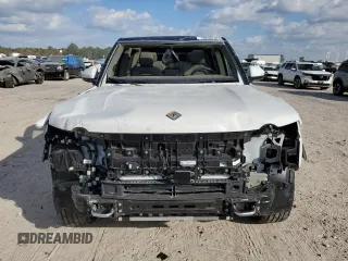 2023 Rivian R1S Adventure with VIN 7PDSGBBA3PN017791, listed as a Copart auction lot 82397374 with 20,733 mi miles and Salvage Title. Bid and sale history available at carsss.com. Image 5.