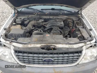 2002 Ford Explorer XLS with VIN 1FMZU72KX2ZC81401, listed as a Copart auction lot 81810034 with 103,291 mi miles and Clean title. Bid and sale history available at DreamBid. Image 12.