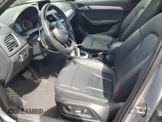2017 Audi Q3 Prestige z VIN WA1GCCFS0HR005569, wystawiony jako Copart lot #57902185 z przebiegiem 89 900 mil mil oraz Szkody całkowita. Historia ofert i sprzedaży dostępna na DreamBid. Obrazek 7.