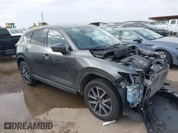 2018 Mazda CX-5 Grand Touring with VIN JM3KFBDM8J0441867, listed as a IAAI auction lot 41565147 with 62,466 mi miles. Bid and sale history available at carsss.com. Image 1.
