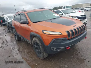 2016 Jeep Cherokee Trailhawk z VIN 1C4PJMBS0GW155379, wystawiony jako IAAI lot #41472352 z przebiegiem 116 036 mil mil oraz . Historia ofert i sprzedaży dostępna na DreamBid. Obrazek 1.