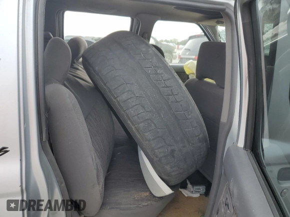 2000 Nissan Frontier XE with VIN 1N6ED27Y1YC396562, listed as a Copart auction lot 49518015 with 429,708 mi miles and Clean title. Bid and sale history available at DreamBid. Image 11.