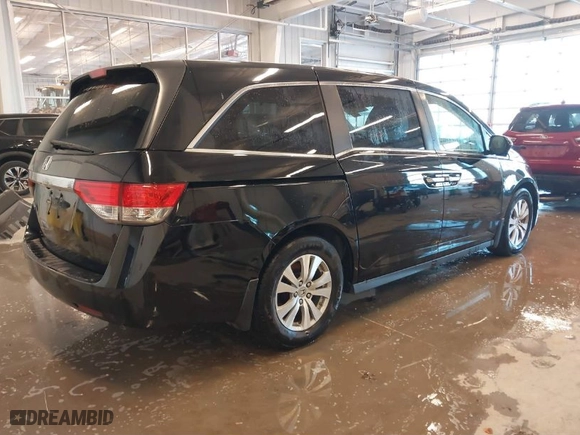 2015 Honda Odyssey EX-L with VIN 5FNRL5H62FB084854, listed as a IAAI auction lot 40959162 with 178,237 mi miles. Bid and sale history available at carsss.com. Image 4.