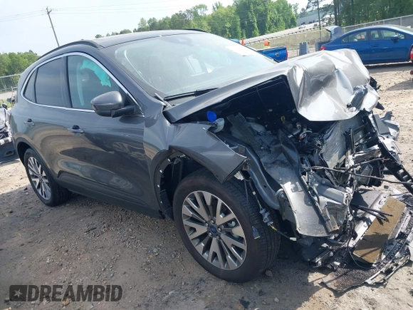 2022 Ford Escape Titanium with VIN 1FMCU9J91NUB87215, listed as a IAAI auction lot 42092928 with 3,255 mi miles and . Bid and sale history available at DreamBid. Image 1.