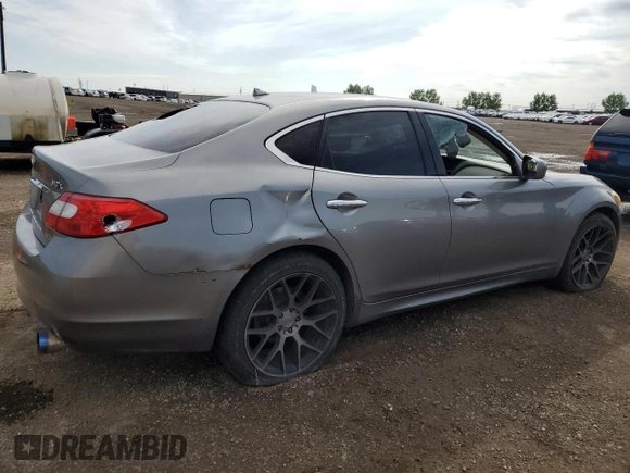 2011 Infiniti M with VIN JN1BY1ARXBM370844, listed as a Copart auction lot 62425515 with 277,315 mi miles and Salvage title. Bid and sale history available at DreamBid. Image 3.