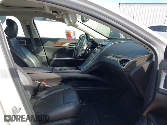 2014 Lincoln MKZ with VIN 3LN6L2GKXER817659, listed as a IAAI auction lot 40896691 with 84,164 mi miles and . Bid and sale history available at DreamBid. Image 5.