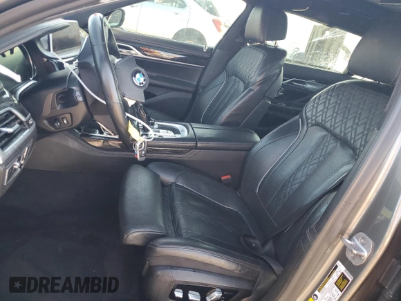 2019 BMW 7 Series 750i with VIN WBA7F0C59KGM25051, listed as a Copart auction lot 87285534 with Not Provided miles and Salvage Title. Bid and sale history available at DreamBid. Image 7.