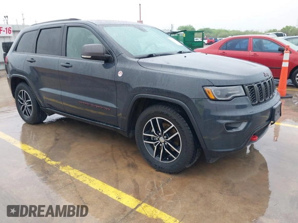 2018 Jeep Grand Cherokee Trailhawk with VIN 1C4RJFLG6JC320763, listed as a IAAI auction lot 41871683 with 115,417 mi miles and . Bid and sale history available at DreamBid. Image 1.