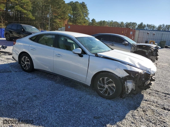 2021 Hyundai Sonata Hybrid Blue with VIN KMHL24JJ8MA030221, listed as a Copart auction lot 84486624 with 77,752 mi miles and Salvage Title. Bid and sale history available at carsss.com. Image 4.